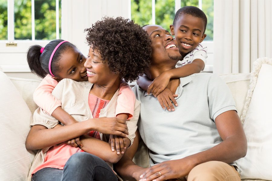 Excess Liability Insurance - Family Looking Lovingly at their Children
